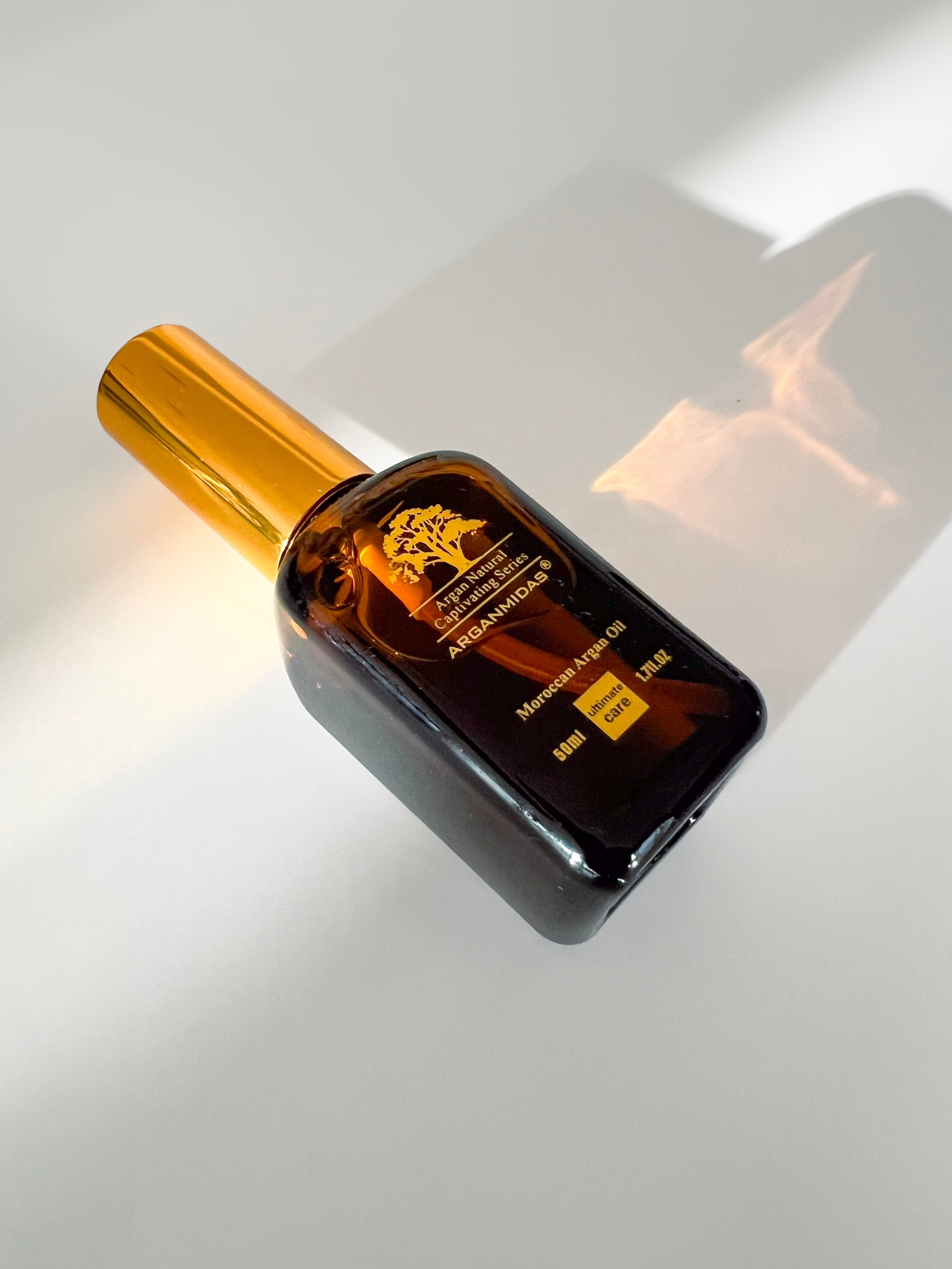 Black and gold bottle on a reflective surface
